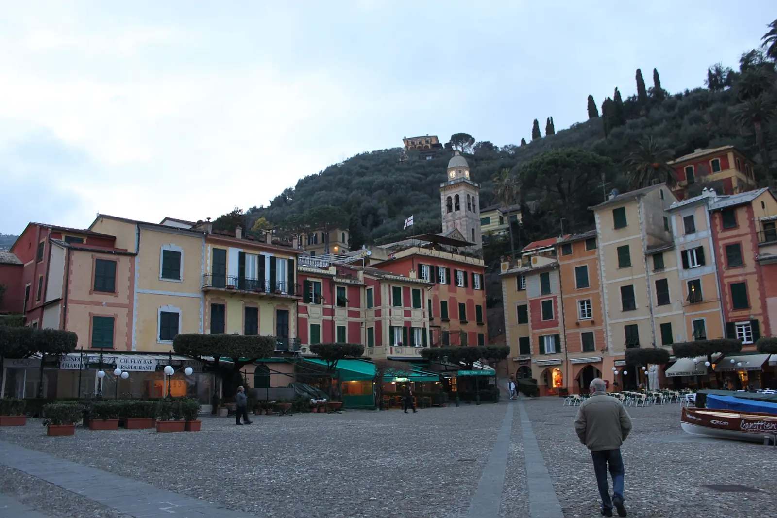 Evening falls over the harbour piazzetta of Portofino