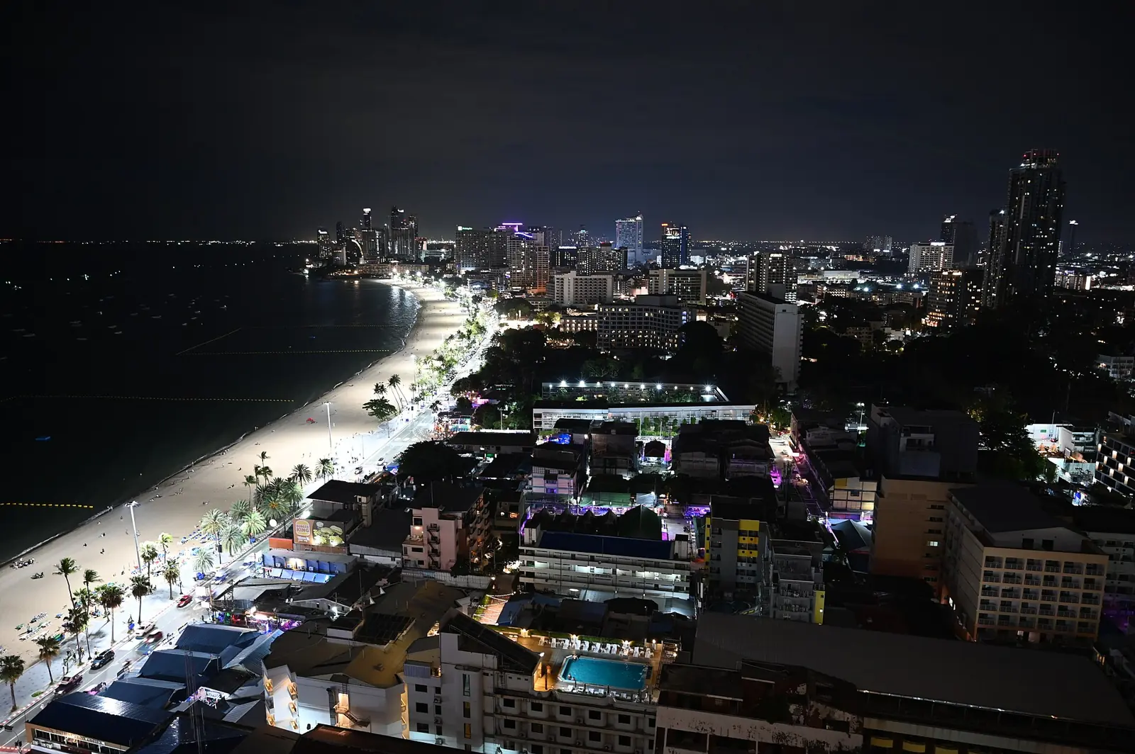 Fort Lauderdale's moonlit coastline and city lights at night